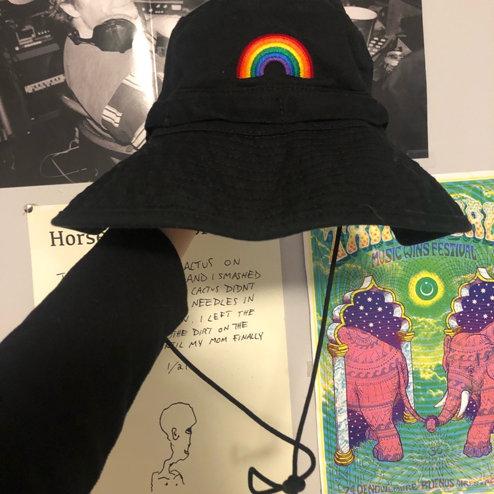 Embroidered rainbow bucket hat.